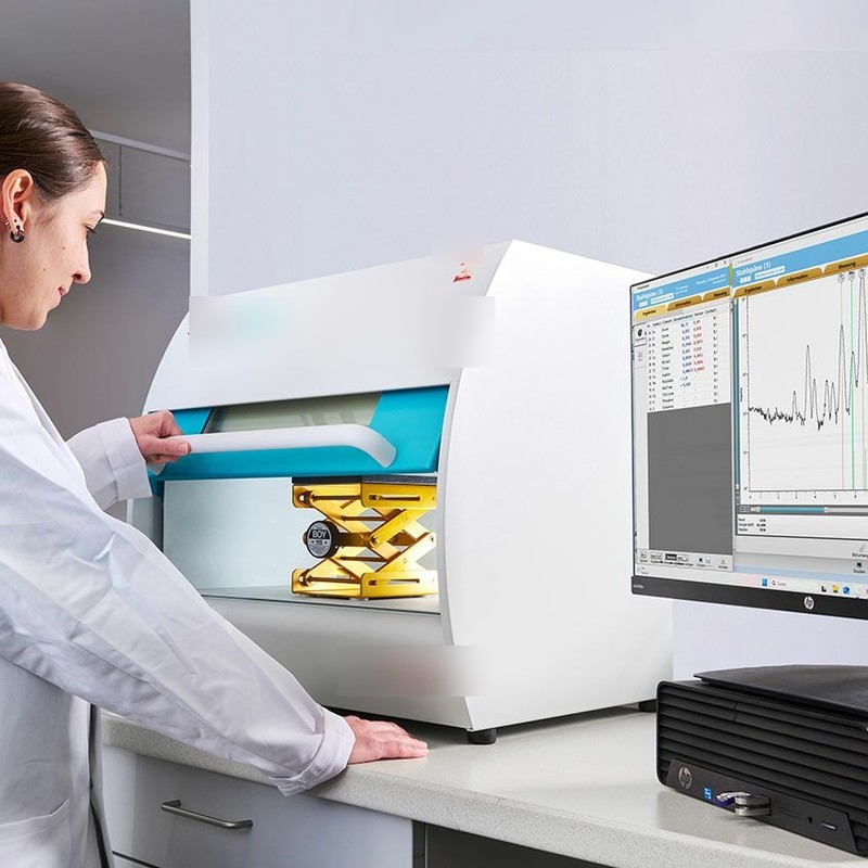 Analyst verifying lab certificate values on screen